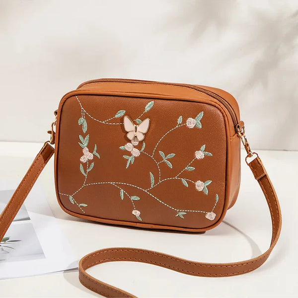 Floral Embroidered Crossbody Bag with Butterfly Charm Brown