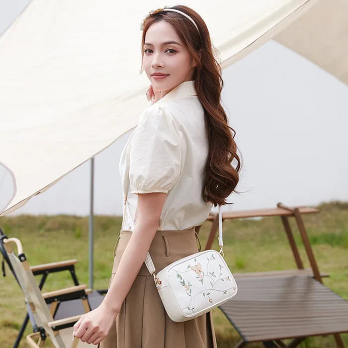 Floral Embroidered Crossbody Bag with Butterfly Charm White
