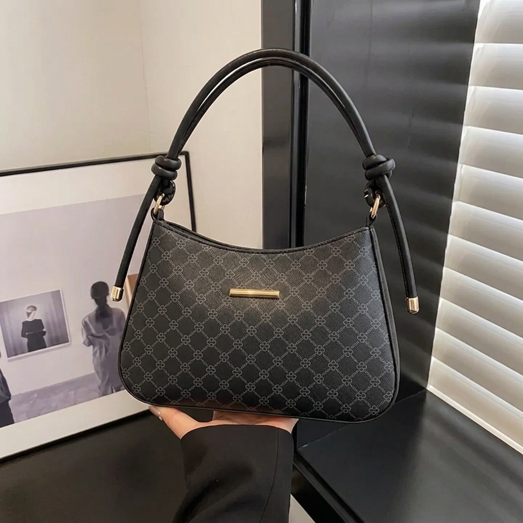 BM15 black shoulder bag with patterned rexine and gold hardware